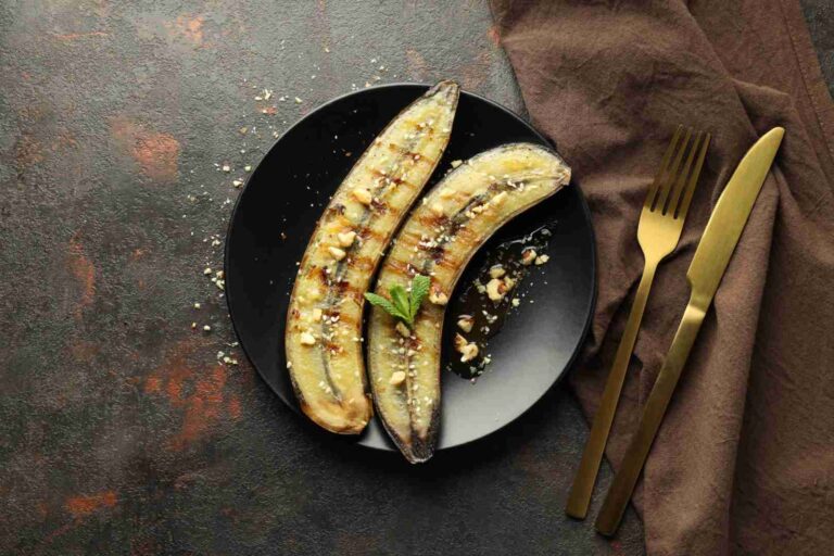Bananes rôties au four nappées de miel d’acacia avec amandes effilées