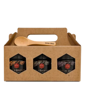 Coffret de trois miels marocains Essentiels Natural Fawaid dans boîte kraft.